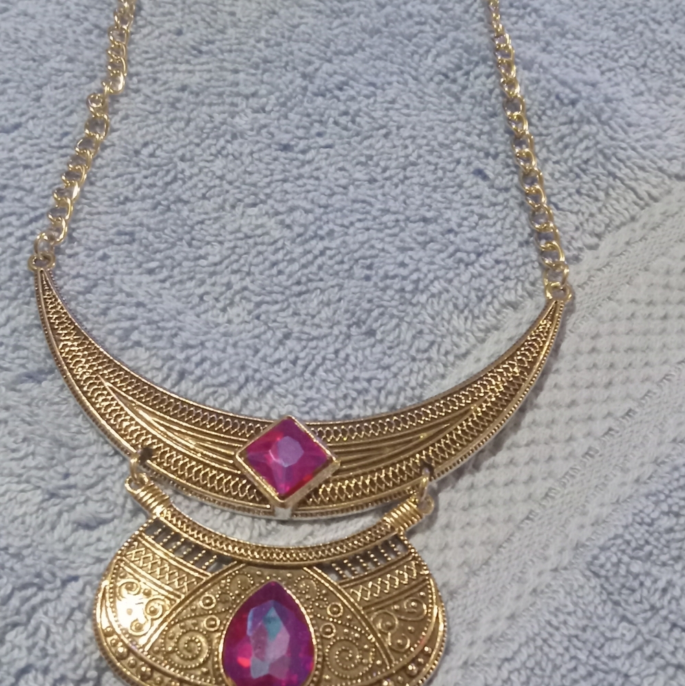 Elegant Gold Necklace with Pink Accents